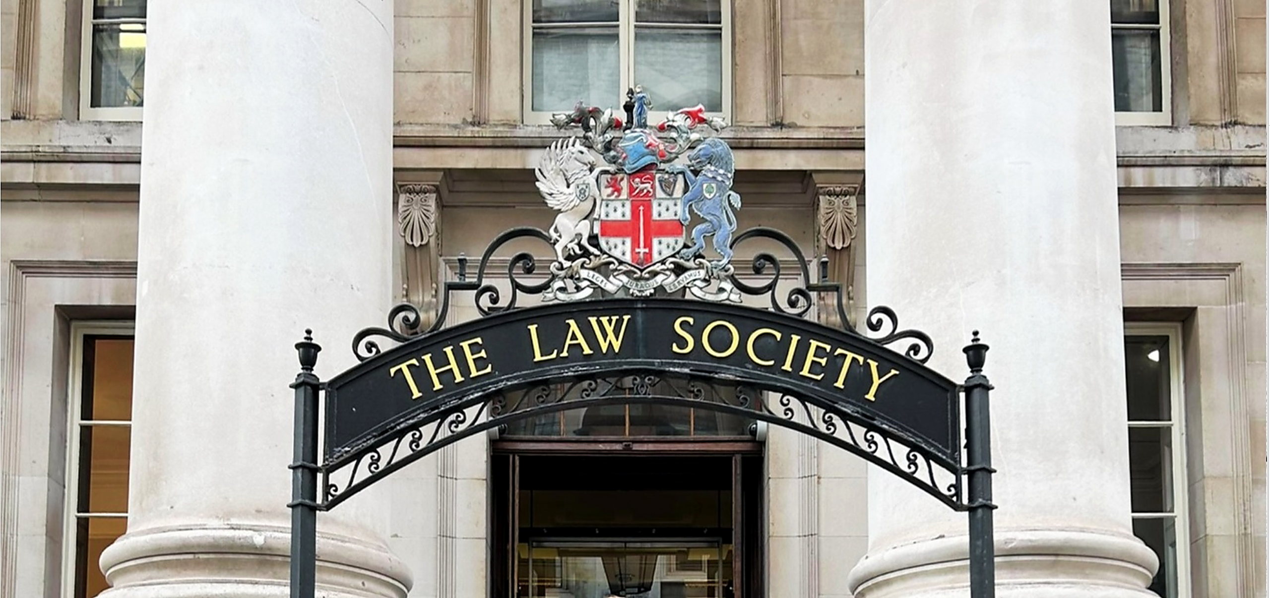 Neoclassical stone facade of a historic London legal building